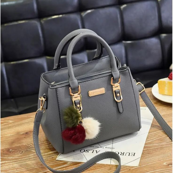 Faux Leather Handbag with Long Straps – Gold Accents & Pompom Keychain, Yiwu Cujia Trade Co., Ltd