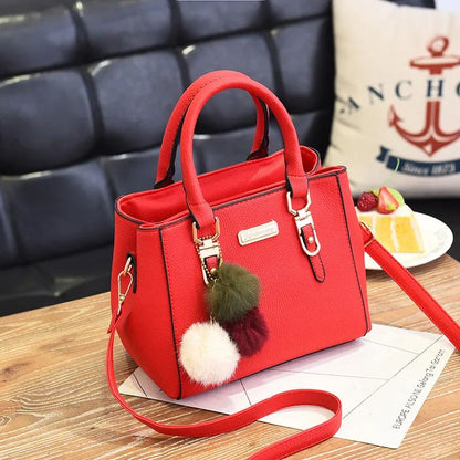 Faux Leather Handbag with Long Straps – Gold Accents & Pompom Keychain, Yiwu Cujia Trade Co., Ltd